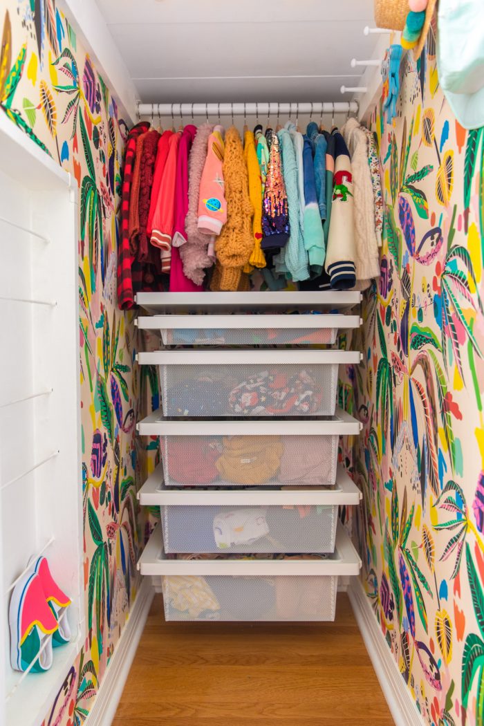 Long Narrow Kids Closet with Tropical Wallpaper