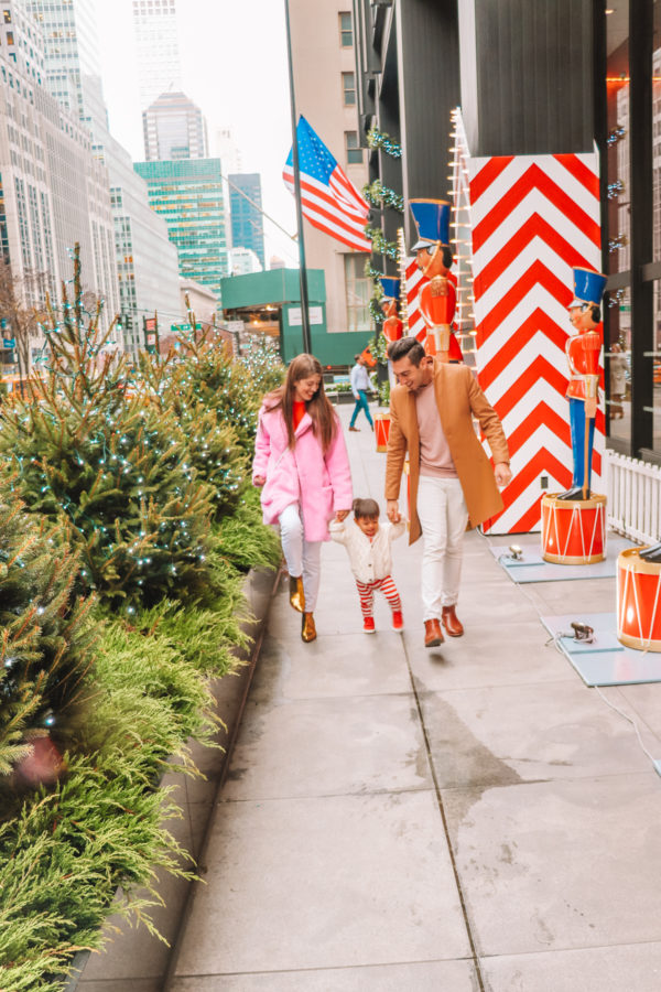 A group of people on a sidewalk