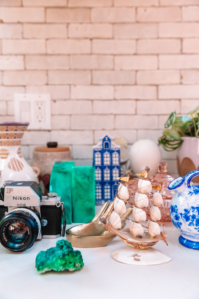 Decor and personal items gathered on counter