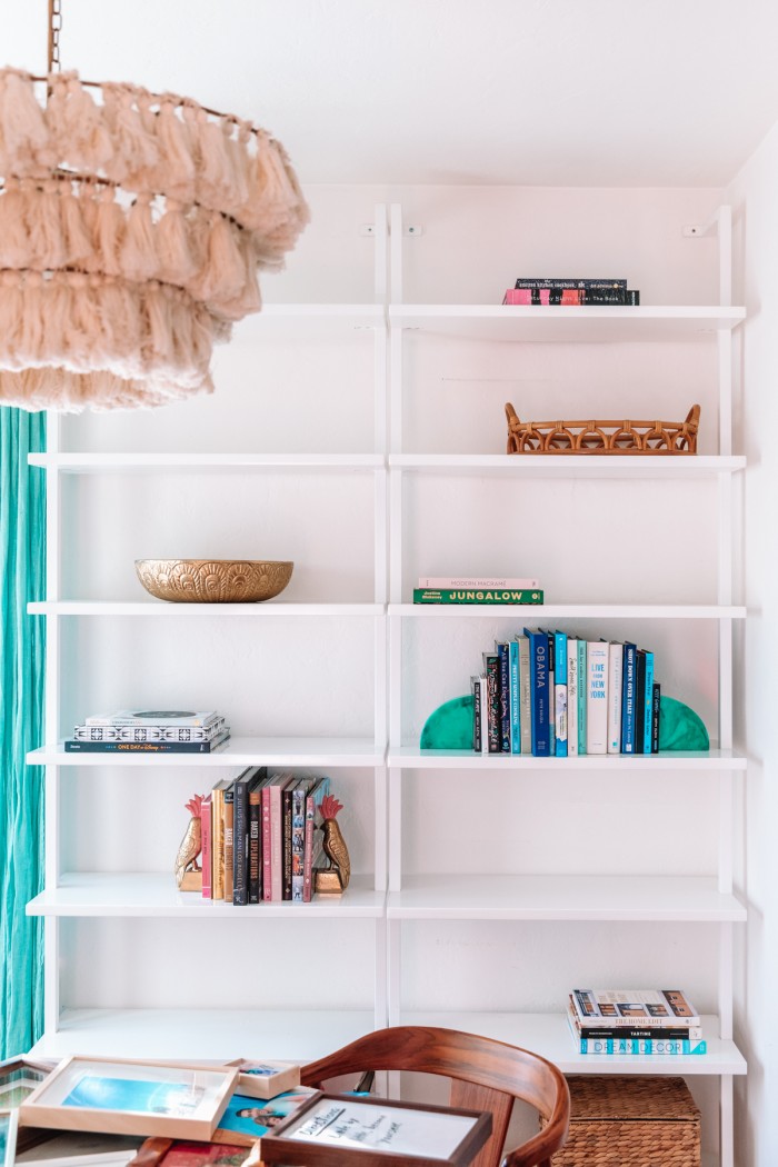 Books and bowls on bookshelves