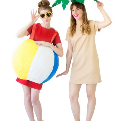 Two women wearing beach costumes 