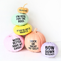 Colorful pumpkins with letters on them