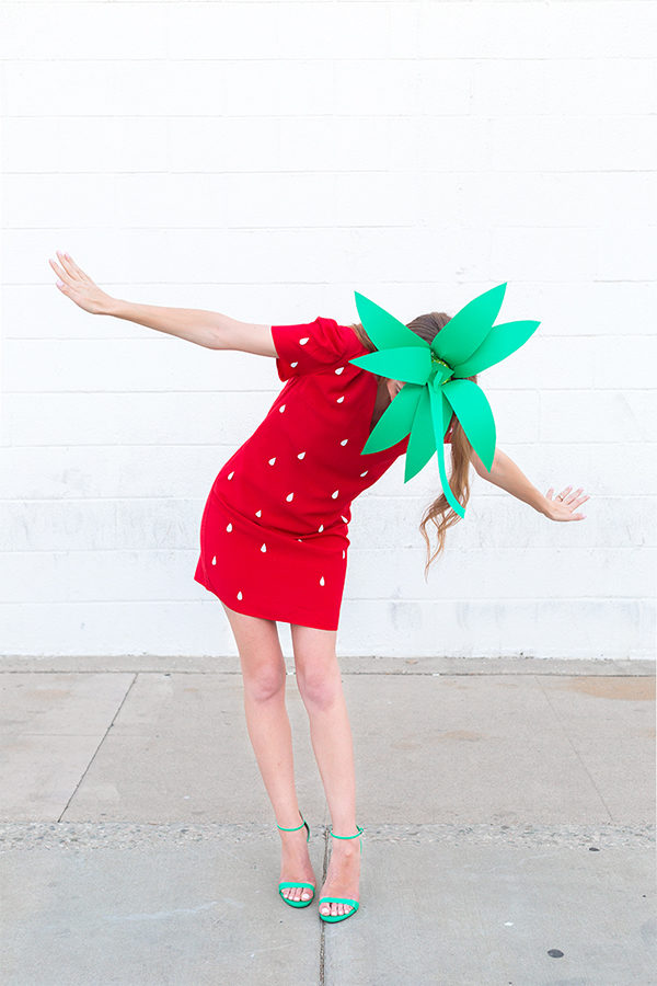 A woman dressed as a strawberry