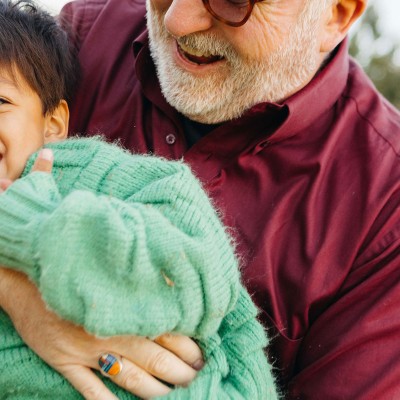 Grandfather holding child