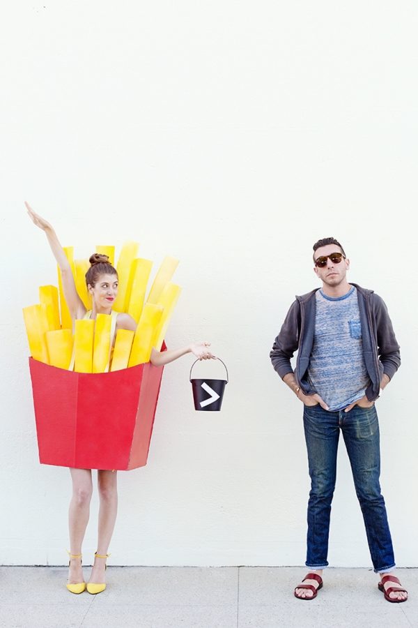 A woman dressed in a french fry costume