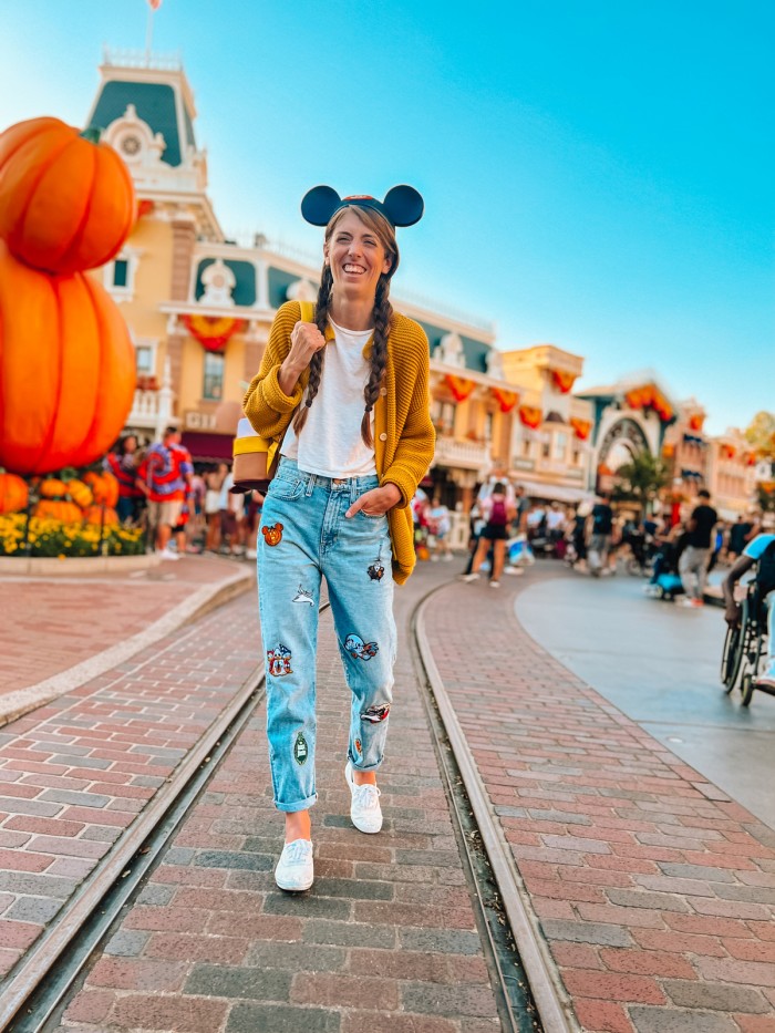 Woman at Disneyland in patch jeans for Halloween