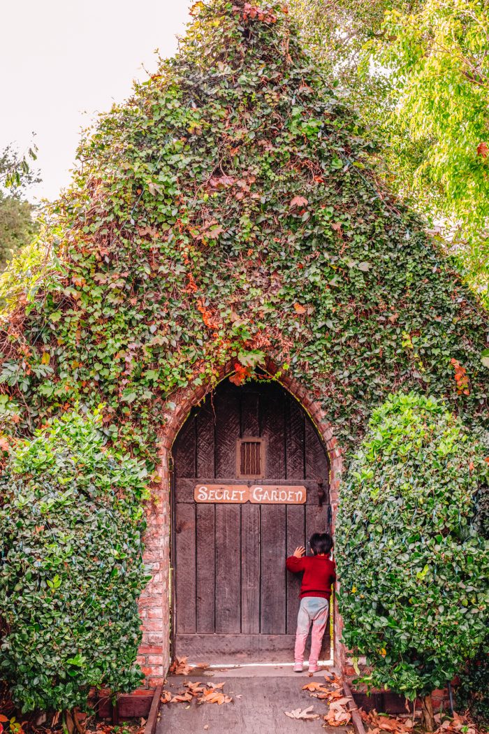 A door with the words secret garden on it