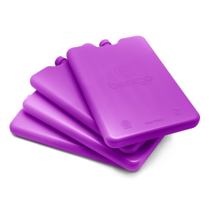 purple thin lunch box ice packs stacked on a white background