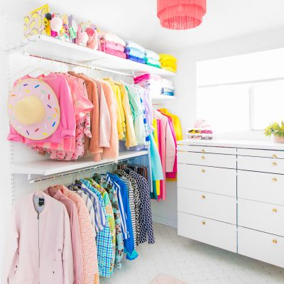 Colorful clothes in a closet