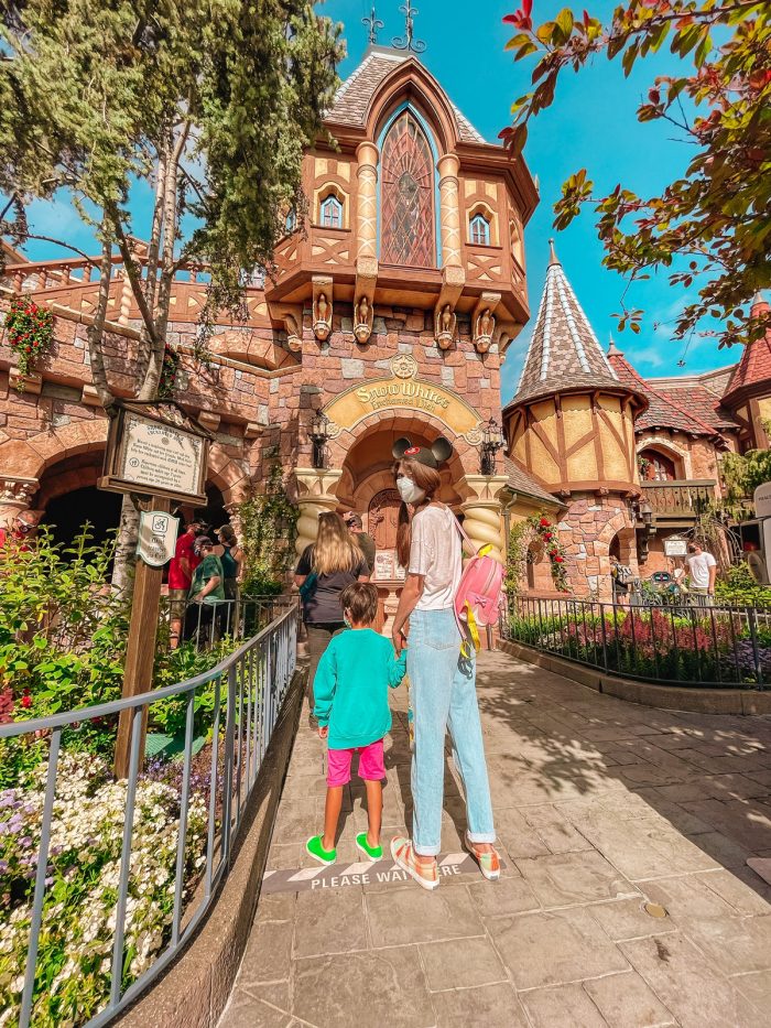 Mom and Son in front of Snow White's Enchanted Wish Disneyland