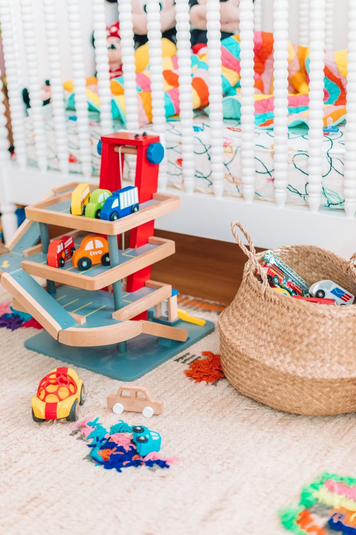 Toys and a basket on a rug