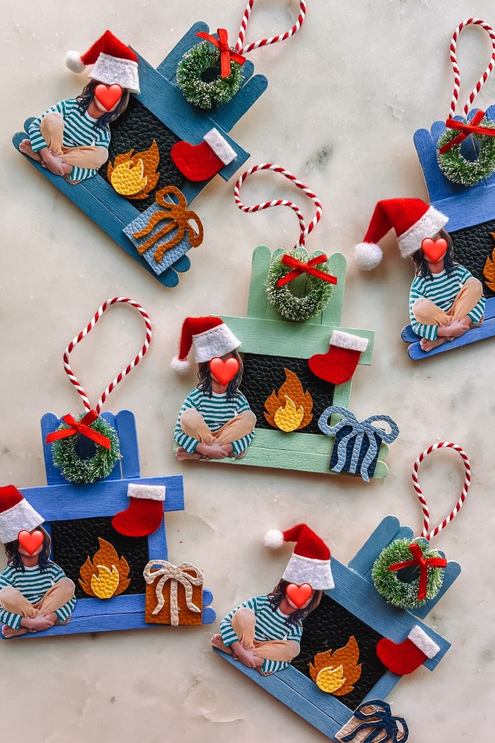 popsicle stick fireplace ornaments on marble table