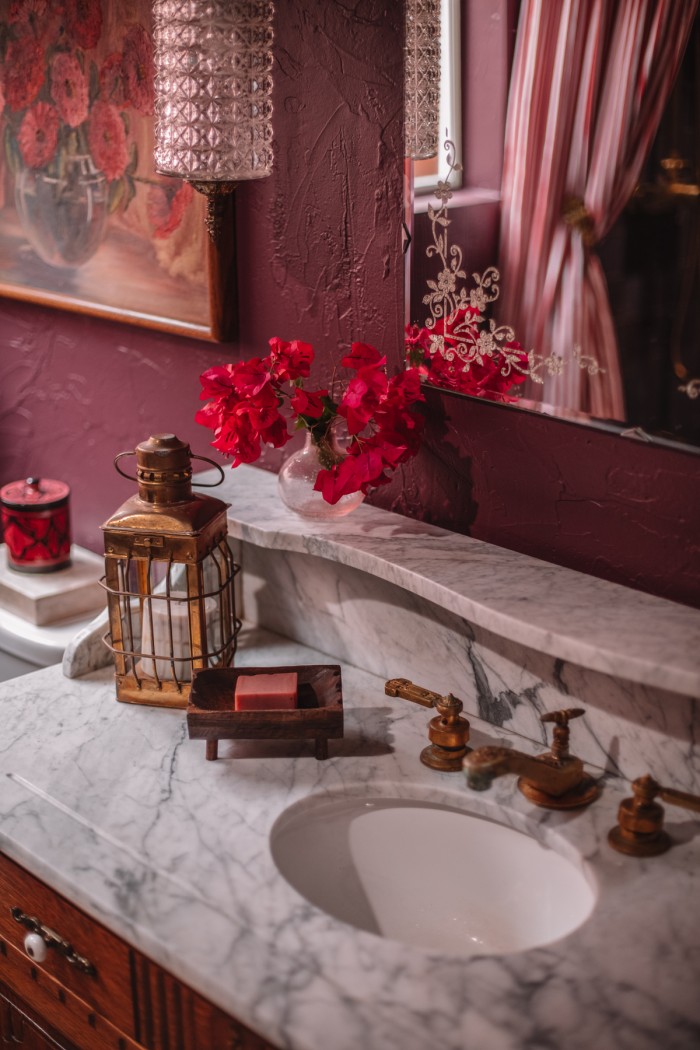 marble vanity top in purple bathroom