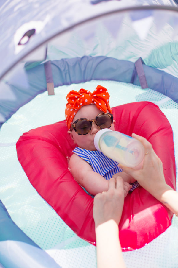 A baby in a floatie