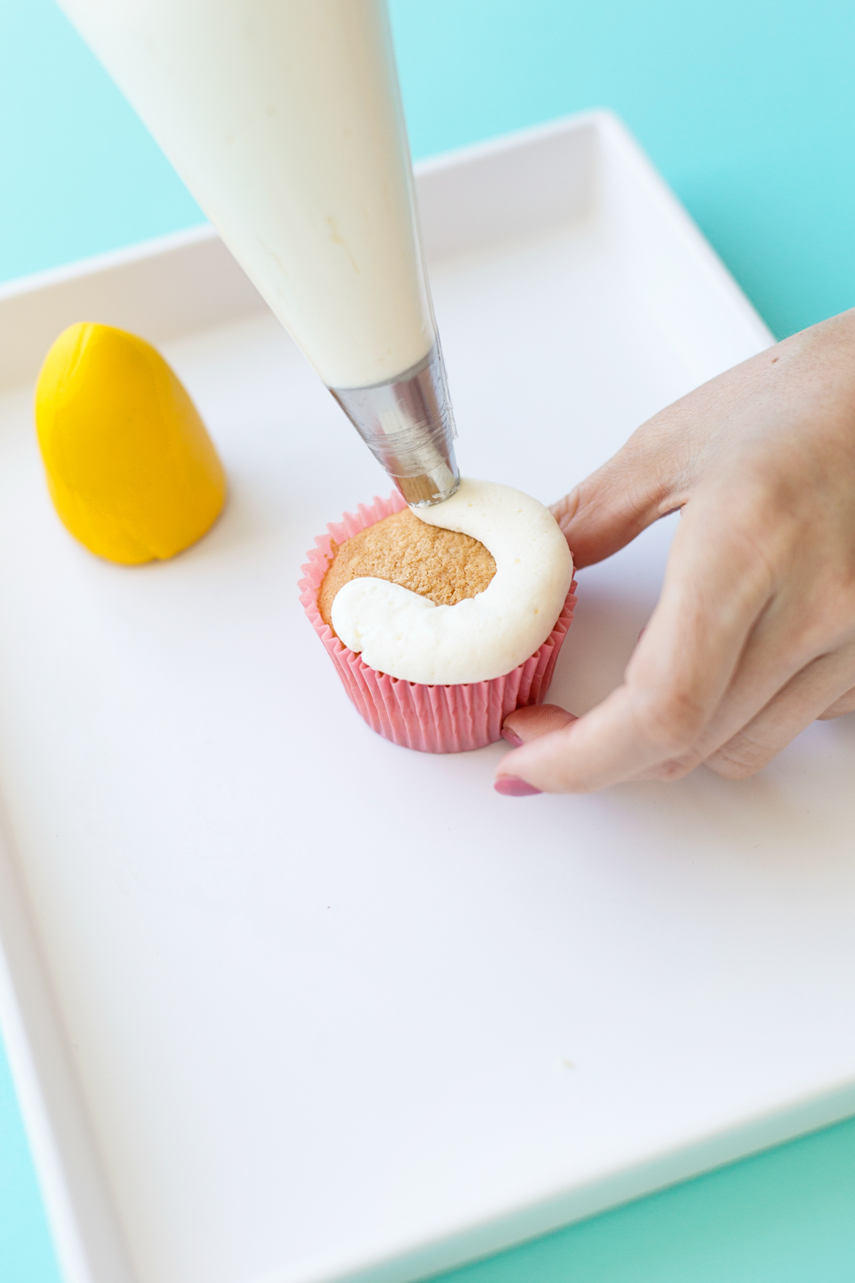 Frosting cupcakes