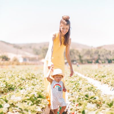 Two people standing in a field