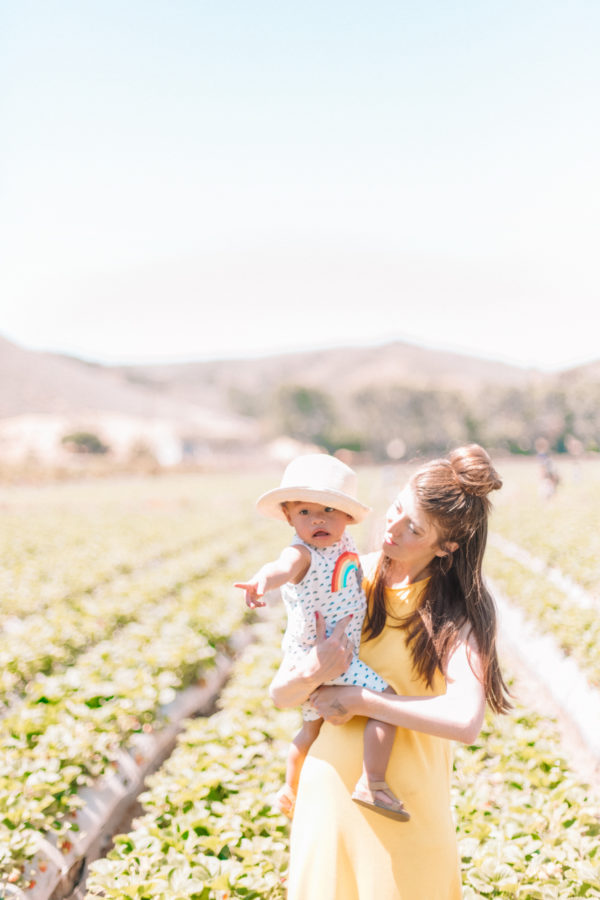 A mom with her son in a field