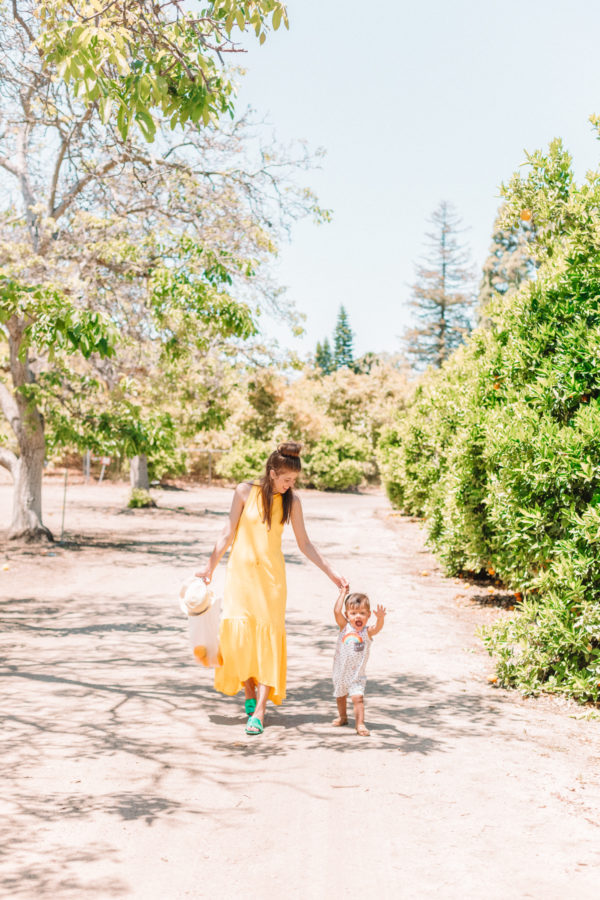 Two people walking down a path