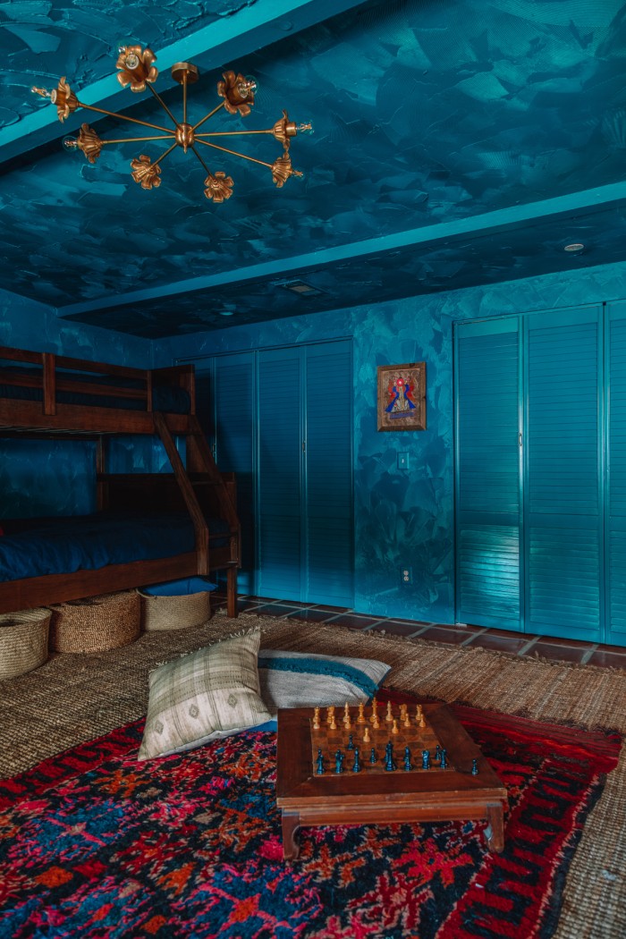 teal room with teal closet doors