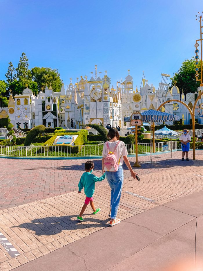 Walking in front of Its A Small World