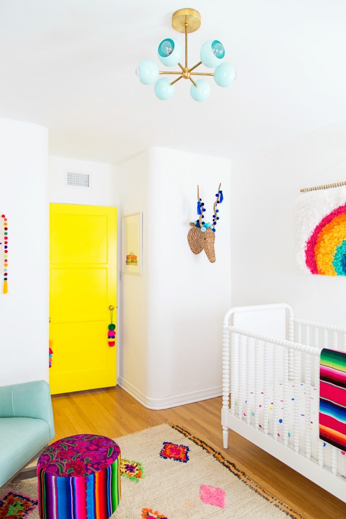 A room with a yellow door